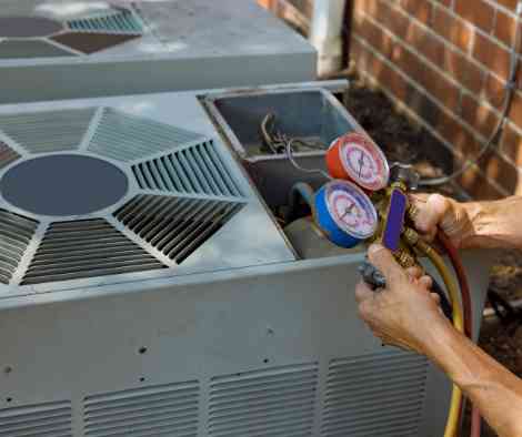 An air conditioner being worked on