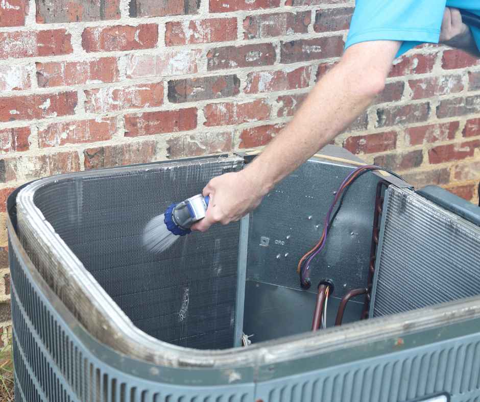 Cleaning air conditioner coils with a hose